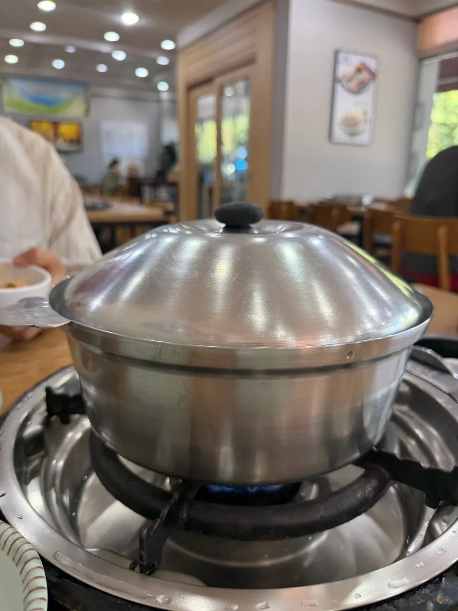Seafood mandu jeongol pot starting to boil