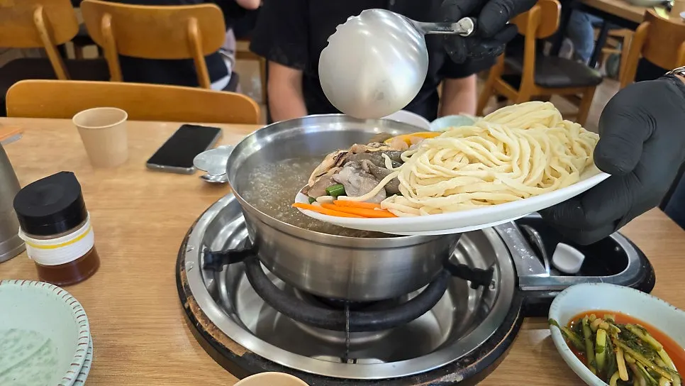 Seafood kalguksu bubbling away