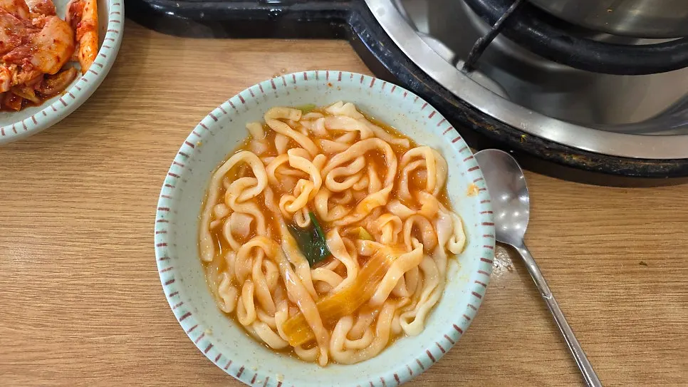 Kalguksu pot emptied down to the broth