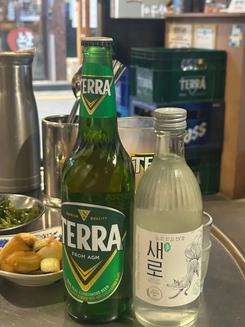 Glasses of somaek with soju and beer
