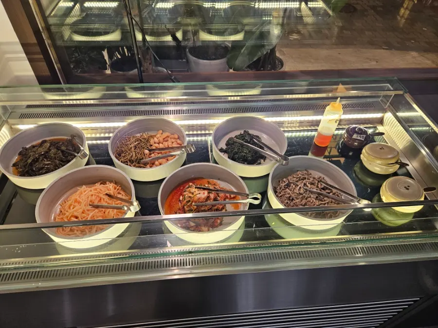 Self-serve bar for refilling lettuce wraps and banchan
