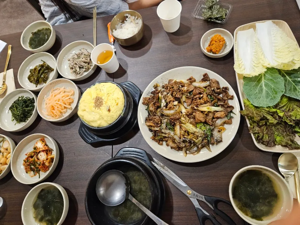 Full dinner spread with meat and side dishes
