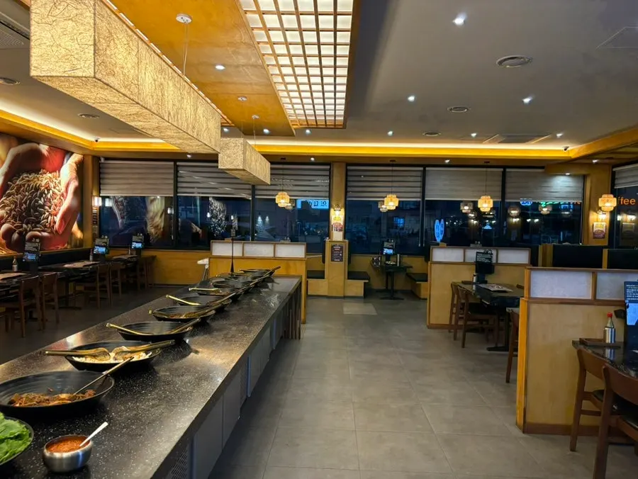 The self-serve bar in one corner of Baengnyeon Boribap
