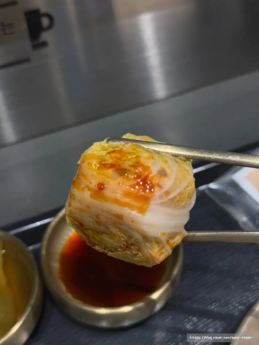 Baekok's cabbage dumpling with filling wrapped in a cabbage leaf