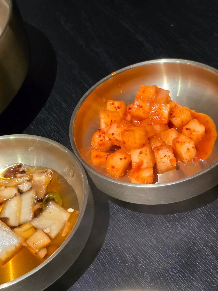 Close-up of clear gomtang packed with meat