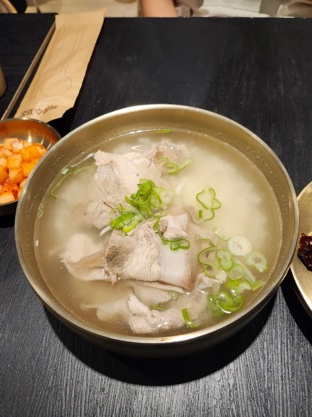 A bowl of Baekok Yongsan's signature pork gomtang