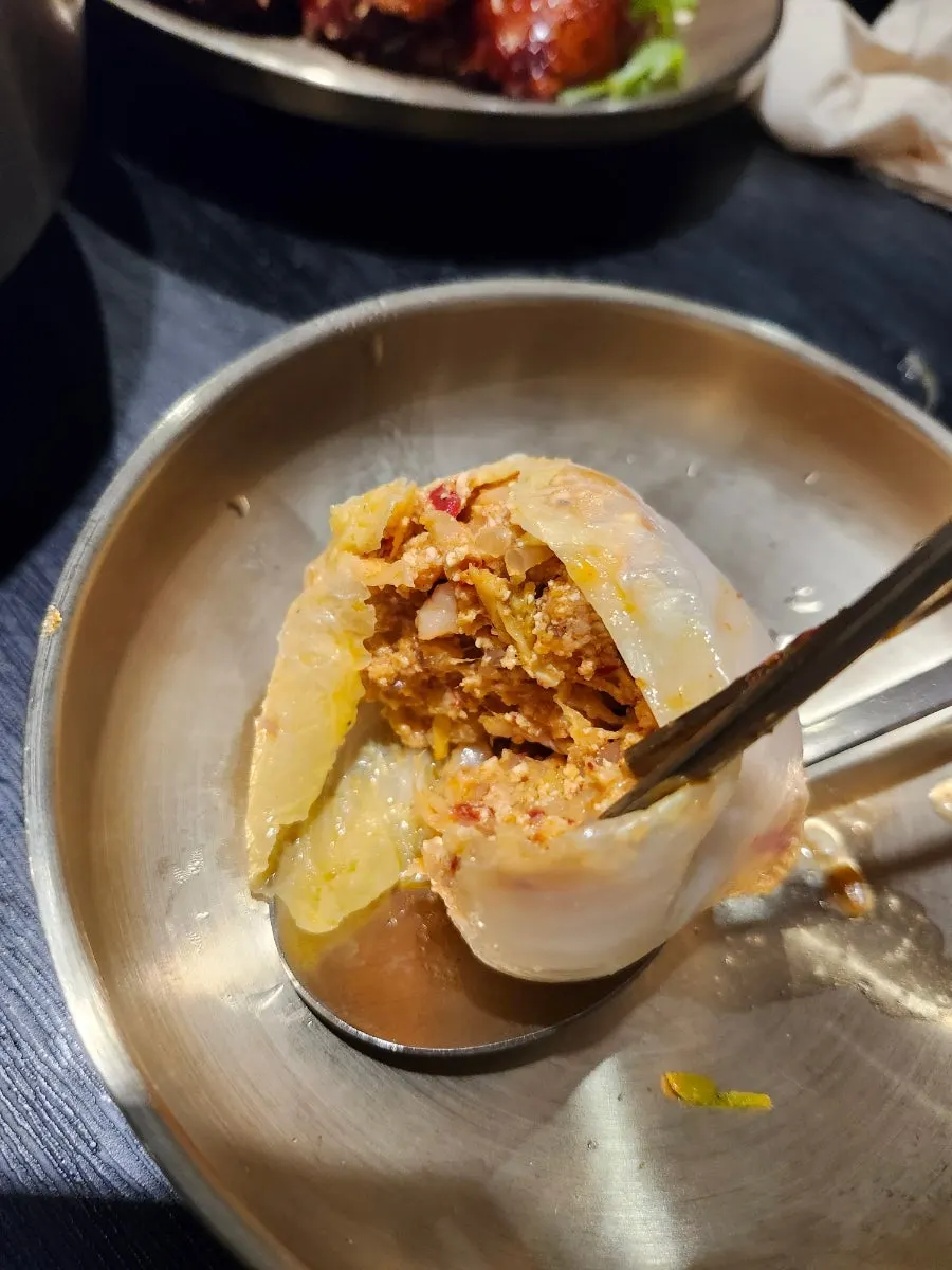 Cross-section of a cabbage mandu packed full inside