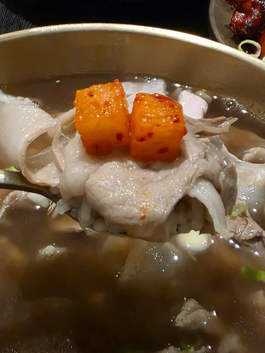 A spoonful of yak-gomtang meat and rice