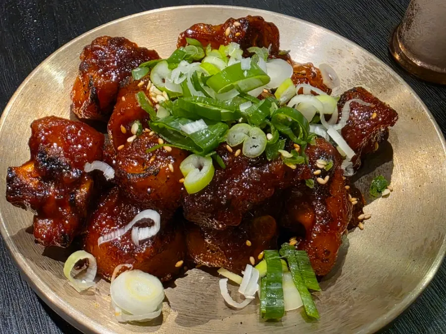 Baekok Yongsan's spicy pig tail in bright red sauce