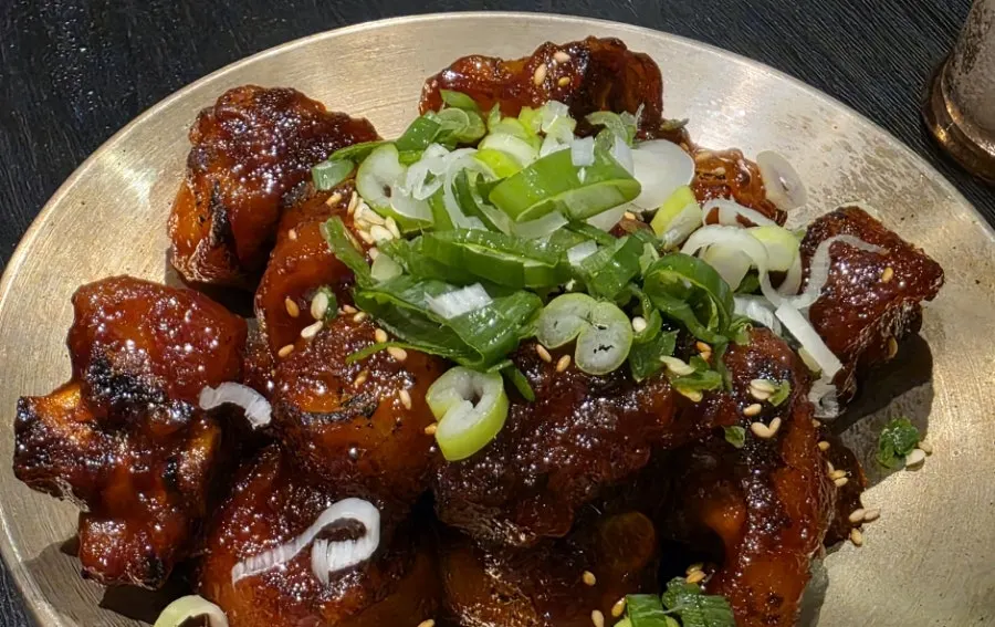 Glossy red sauce on the level 1 spicy pig tail