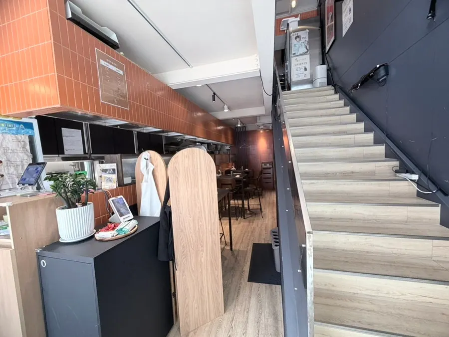 First-floor entrance and signage at Baekok Yongsan