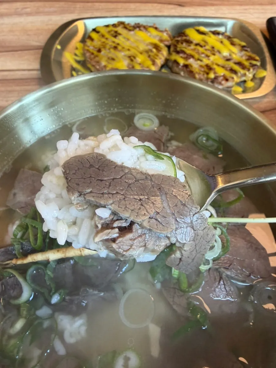 Thick cuts of meat inside the gomtang
