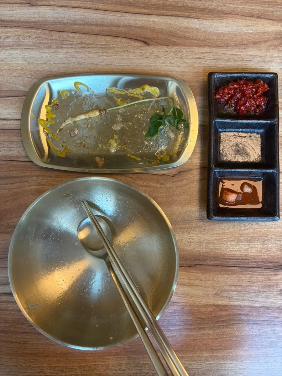 A table set with gomtang and tteokgalbi