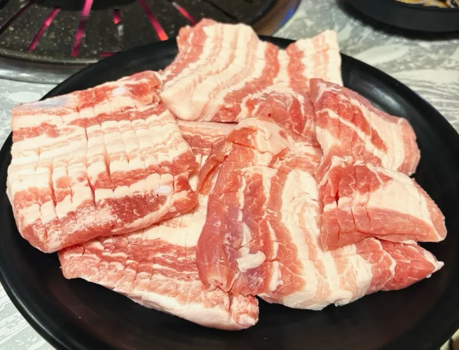 Large chunks of charcoal on the grill