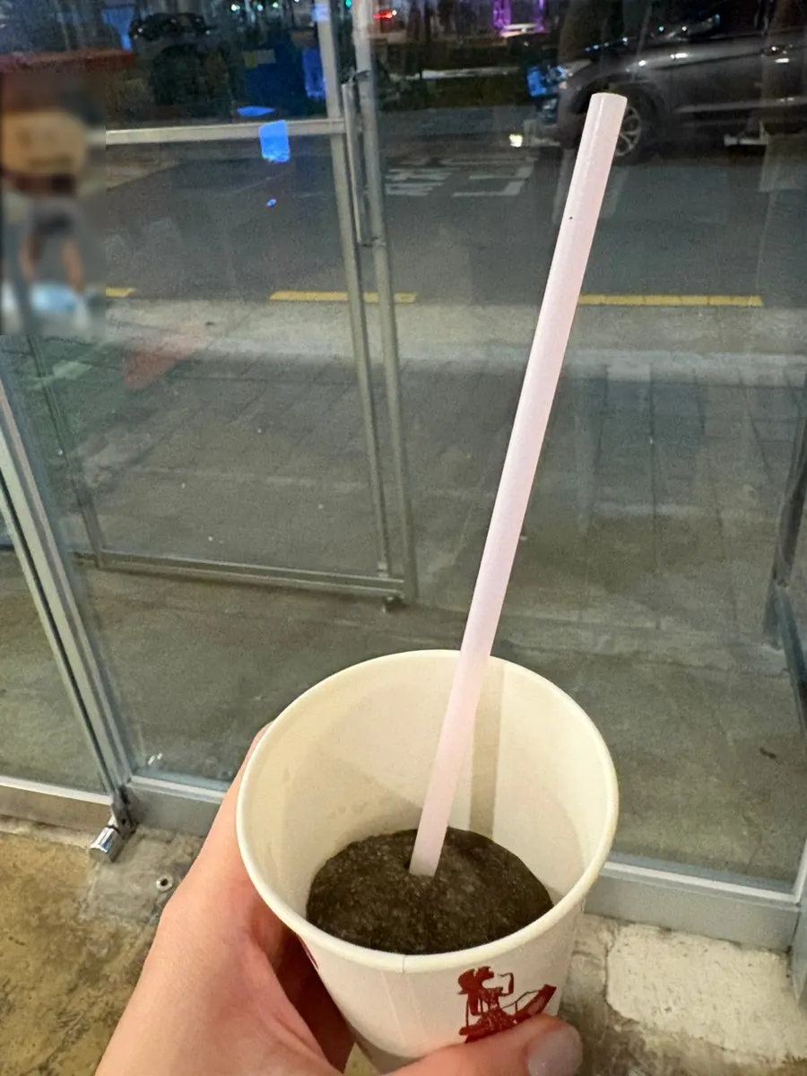 Cup of sweet grape-flavored slush