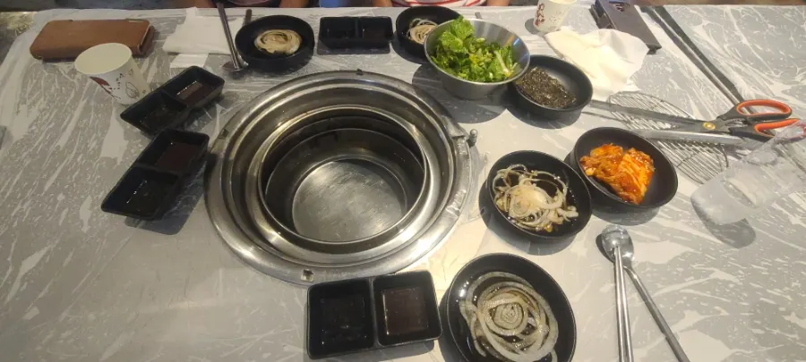 Basic side dishes including pickled onion and kimchi