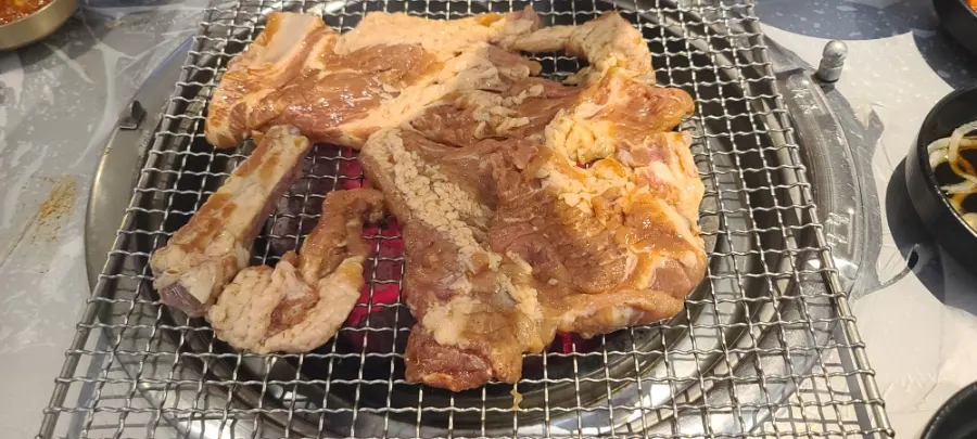 Real Pork Galbi 1kg placed on the grill