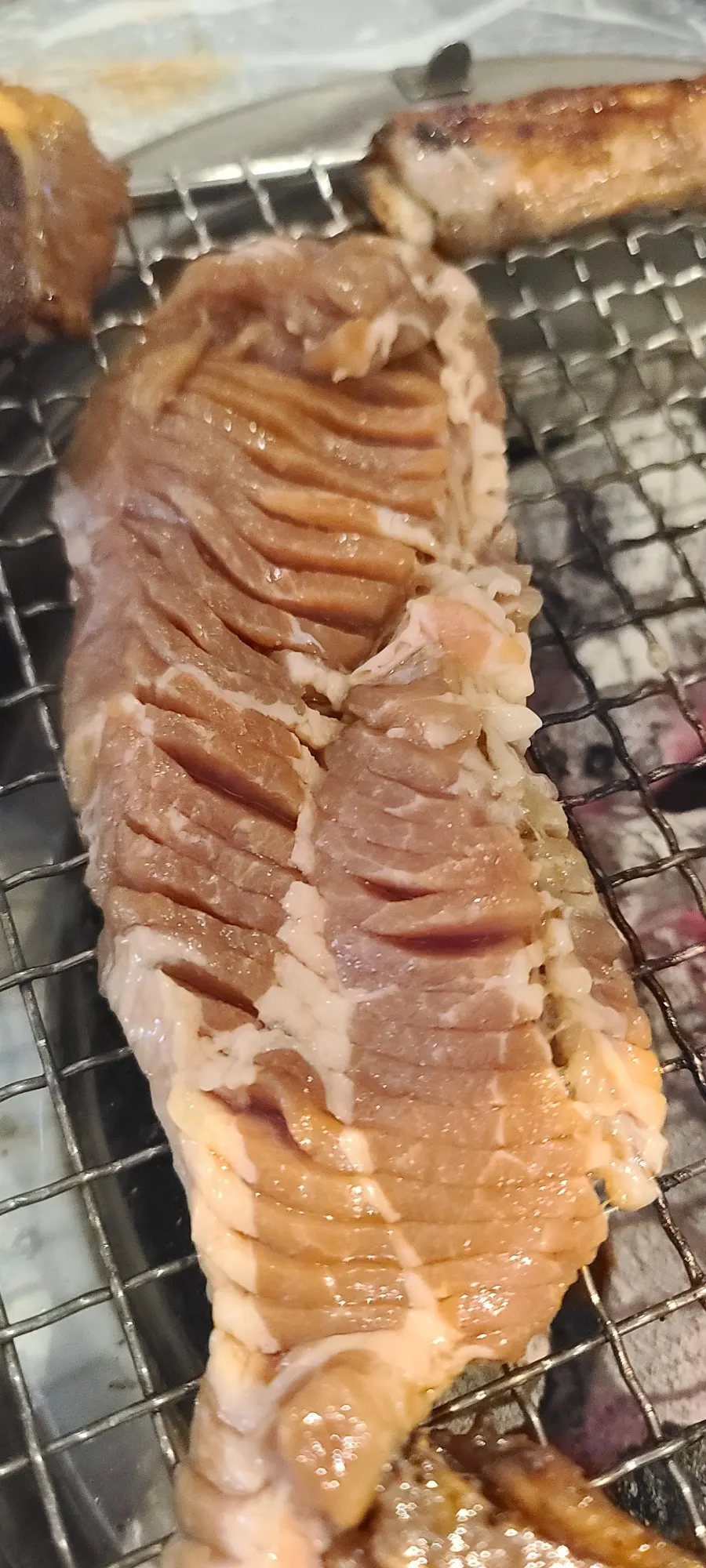 Pork galbi browning nicely over charcoal