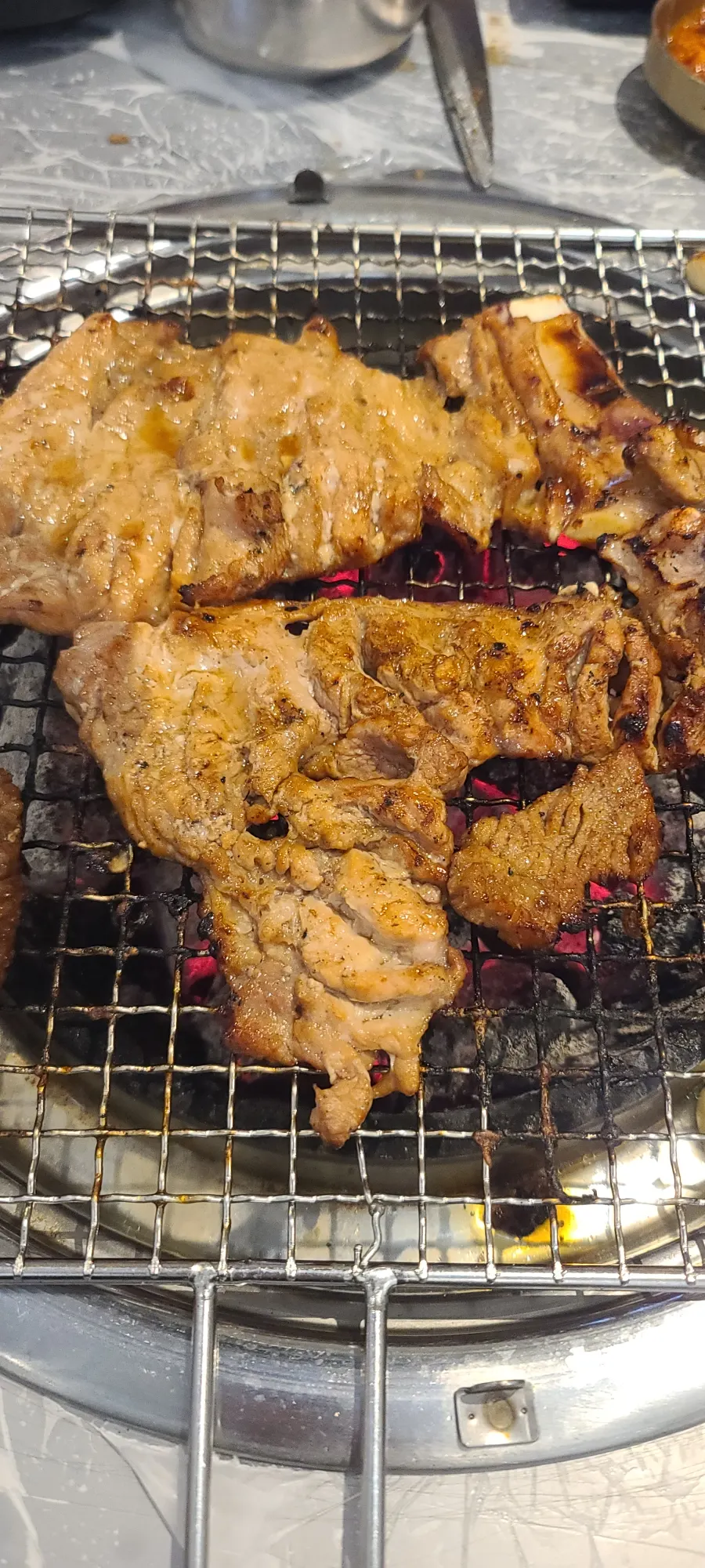 Pork galbi wrap topped with homemade ssamjang and onion