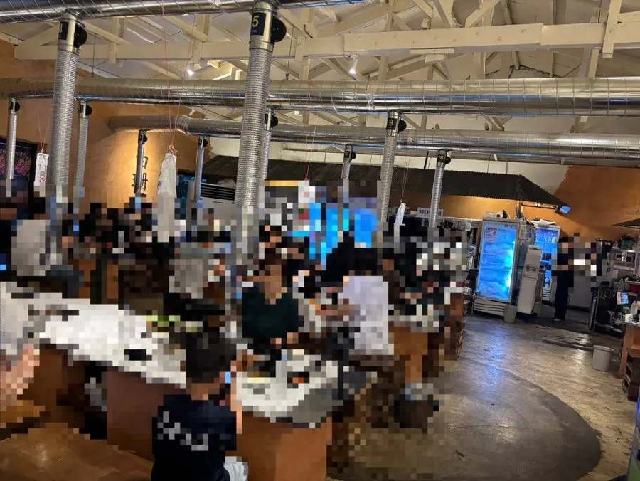 The spacious dining hall at Baeksanu Sutbul packed with customers