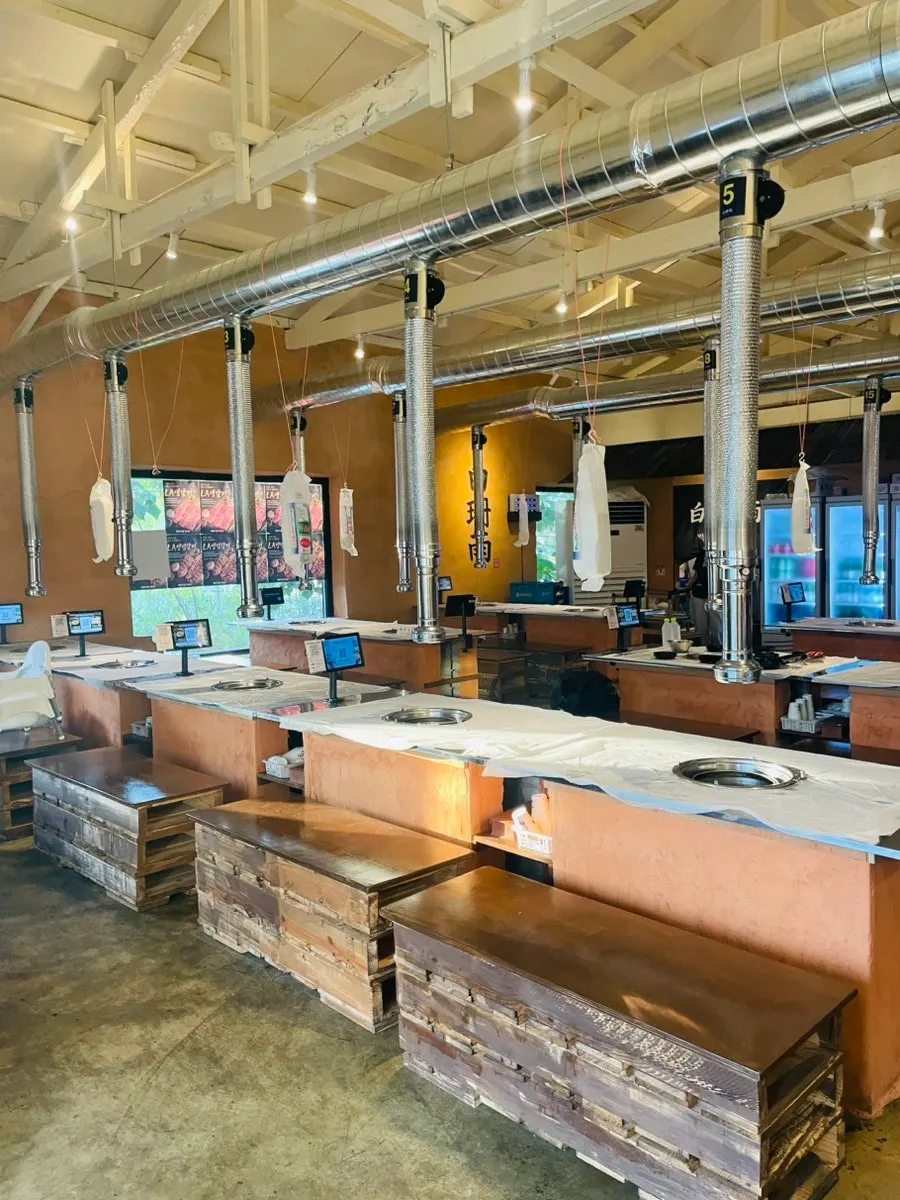Open interior with high ceiling of the BBQ restaurant