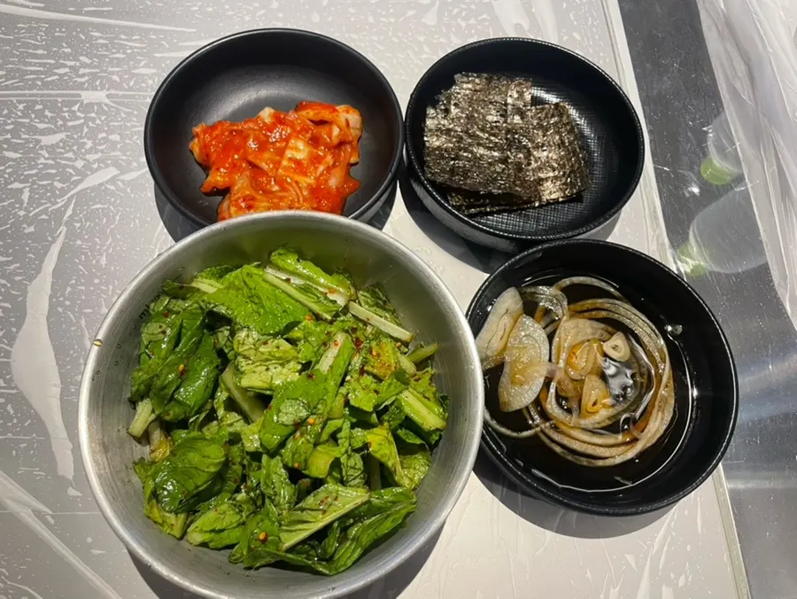 Basic table setting with kimchi and fresh kimchi