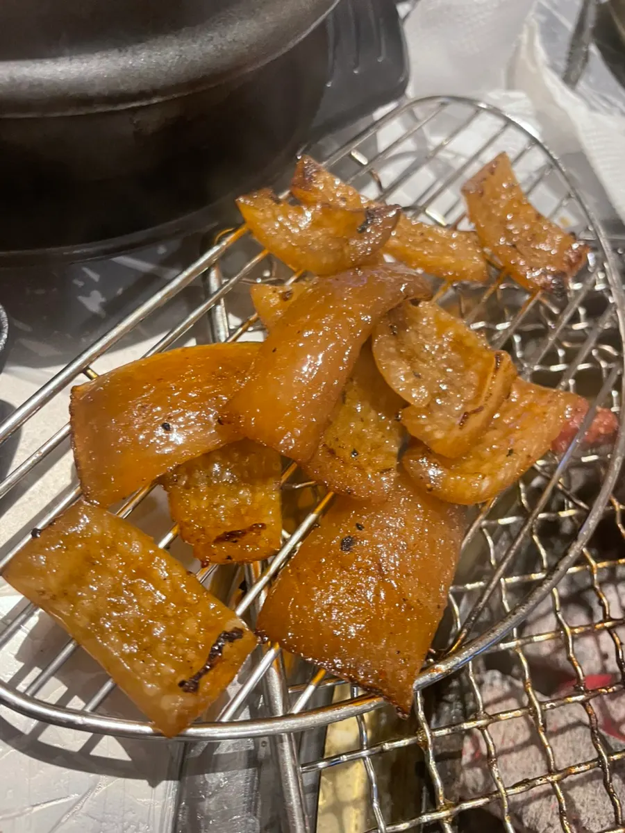 Chewy grilled pork skin