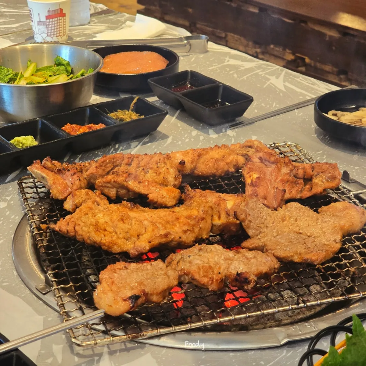 Representative photo of charcoal pork galbi at Baeksanu Sutbul Wolseong Main Branch