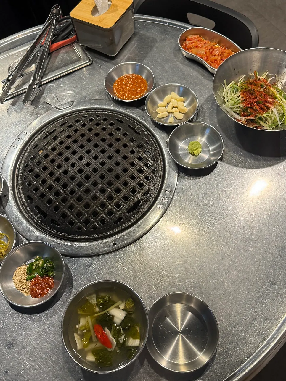 Disposable aprons placed at each table