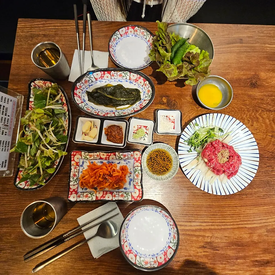 Side dishes laid out at the start of the meal