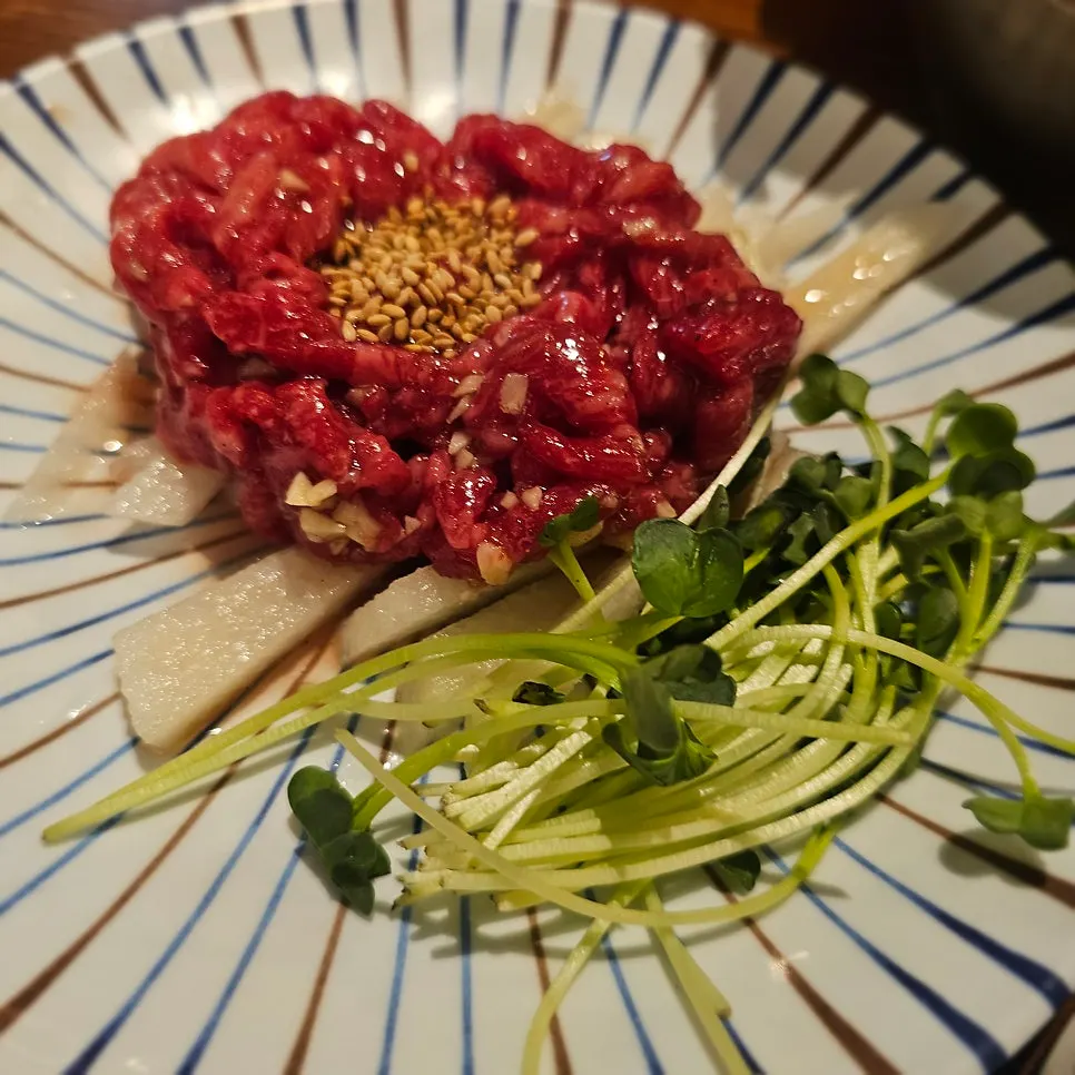 Yukhoe (beef tartare) topped with egg yolk