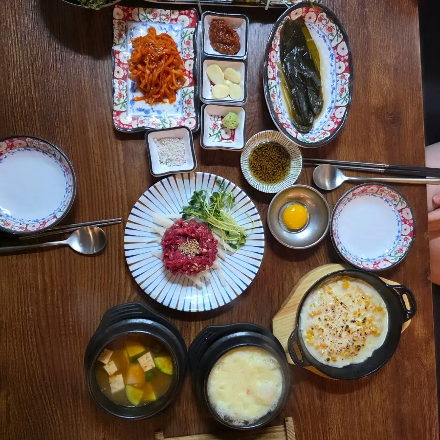 Table with several side dish plates