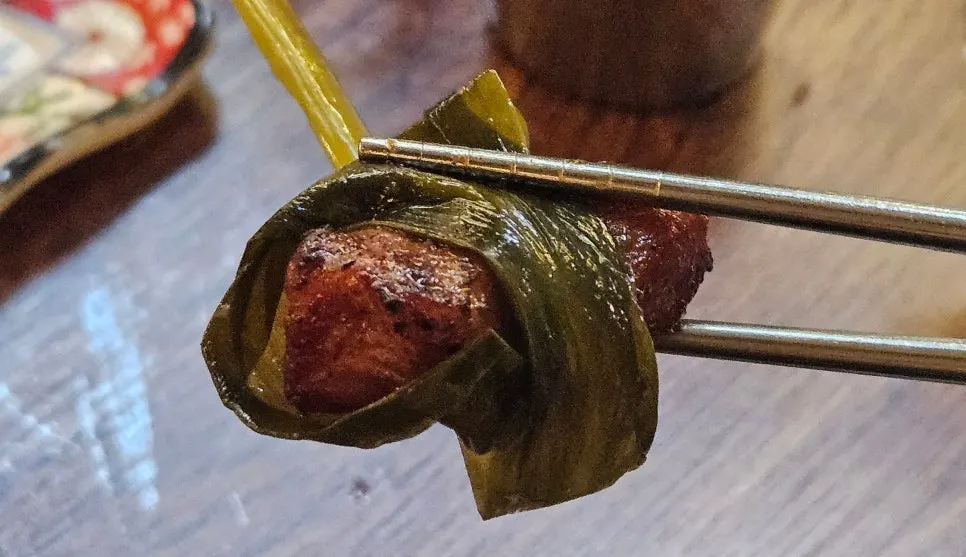 Marinated pork wrapped in myeong-i namul