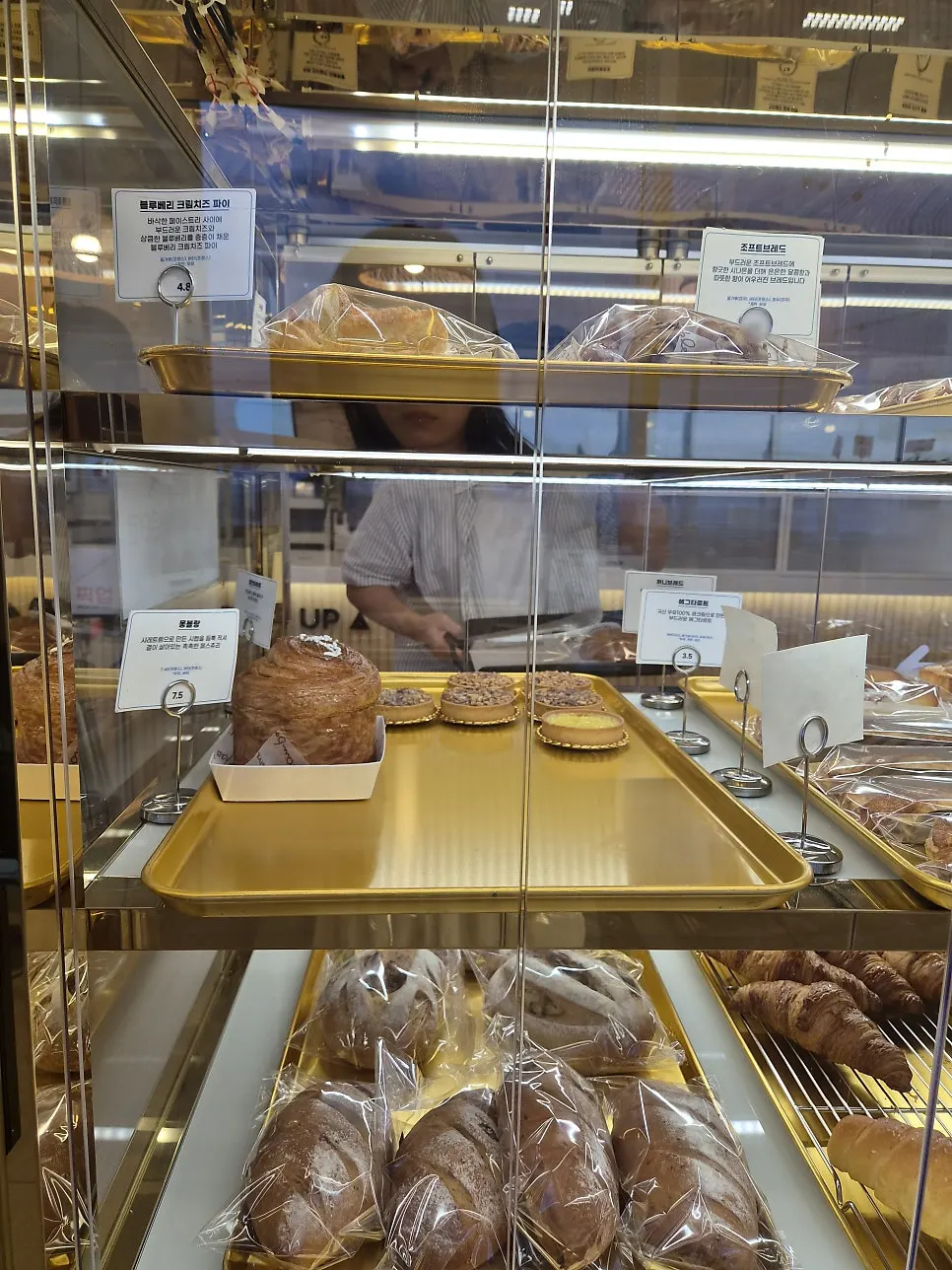 Tarts and twisted doughnuts displayed at Baegya Coffee