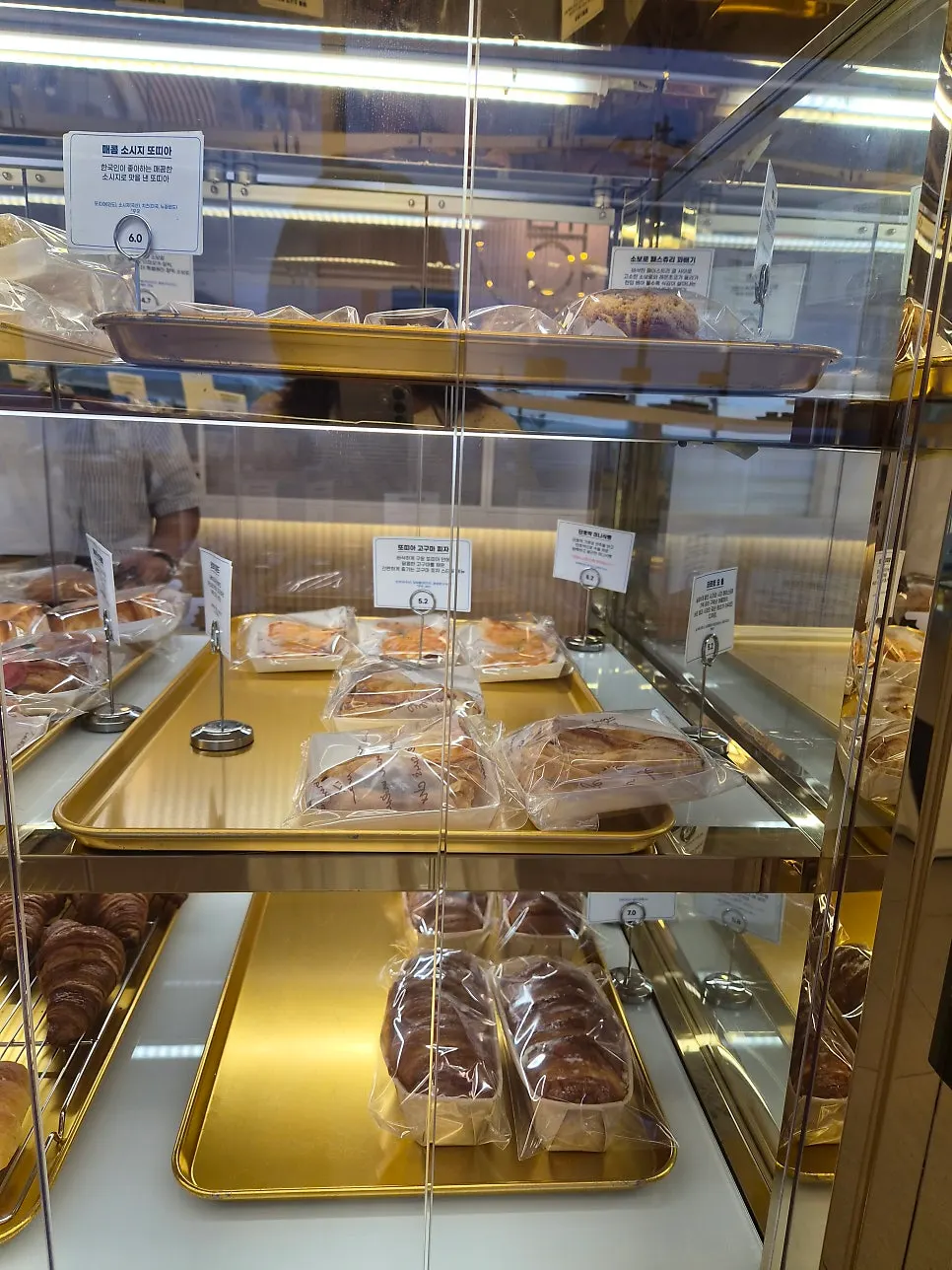 Salt bread and tortilla varieties displayed at Baegya Coffee