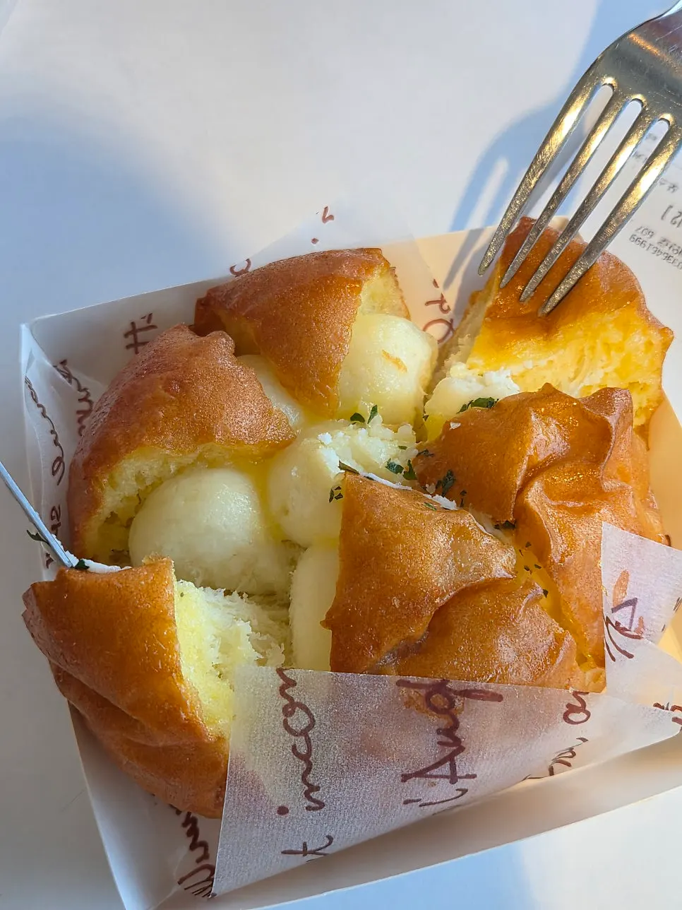Cross-section of Baegya Coffee's milk tank bread showing its milk cream filling