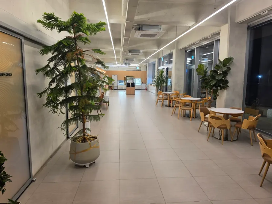 First-floor space at Baegya Coffee with several tables