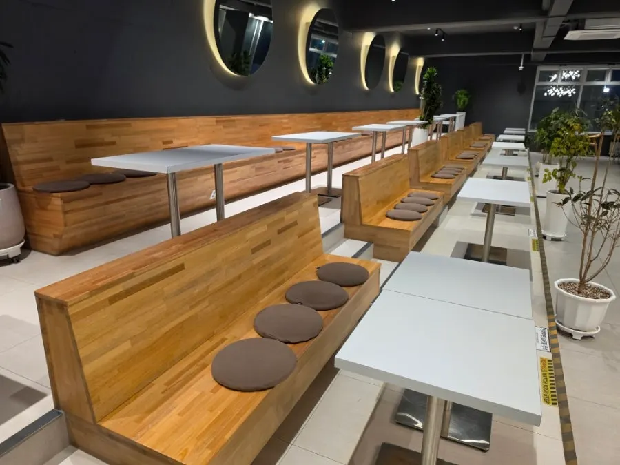 Open, airy seating area on the second floor of Baegya Coffee