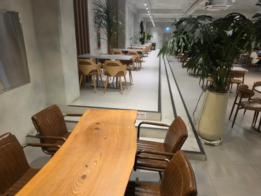 Seating and atmosphere on the third floor of Baegya Coffee