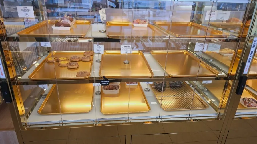 Large bakery bread display at Baegya Coffee
