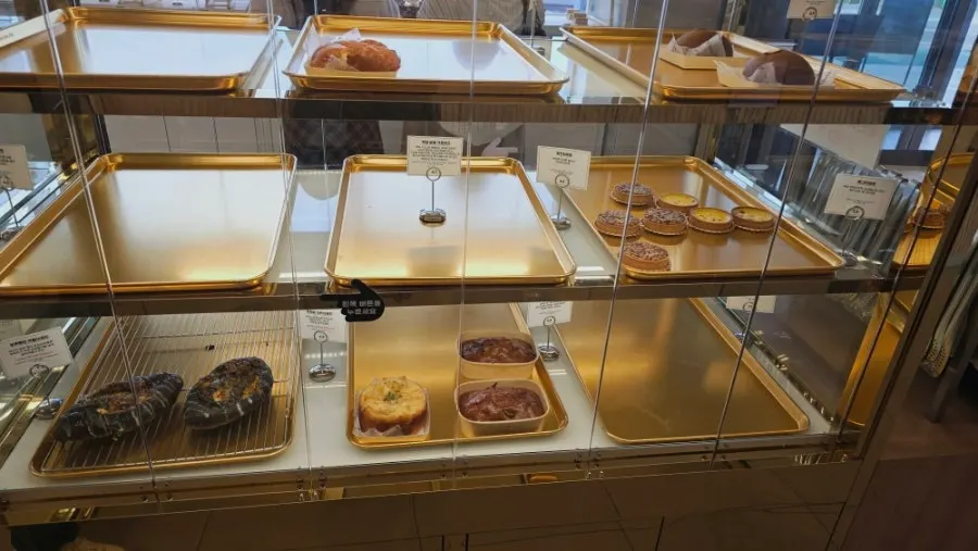 Bread display at Baegya Coffee mostly sold out on a weekday afternoon