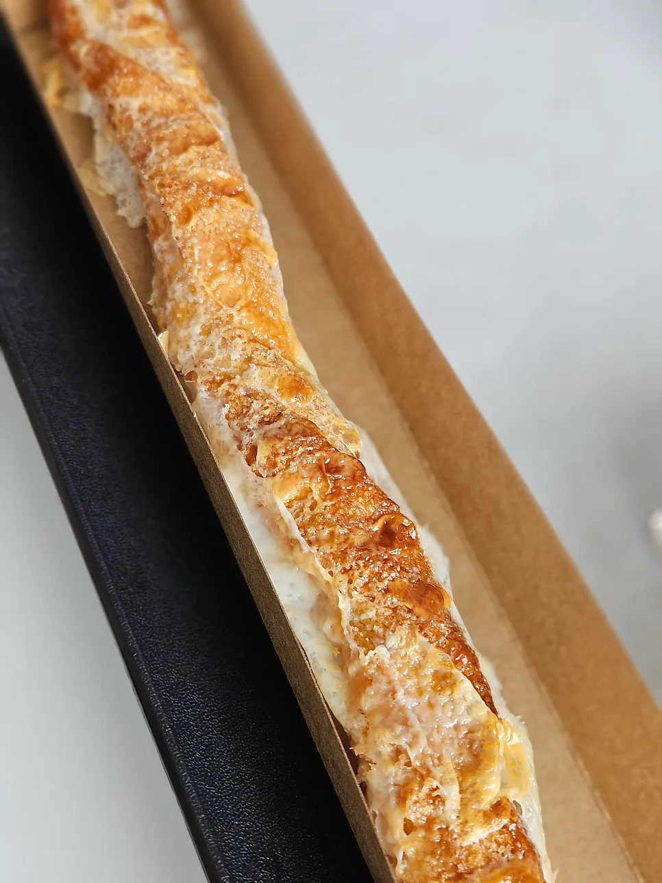 Close-up of two bakery items on a plate