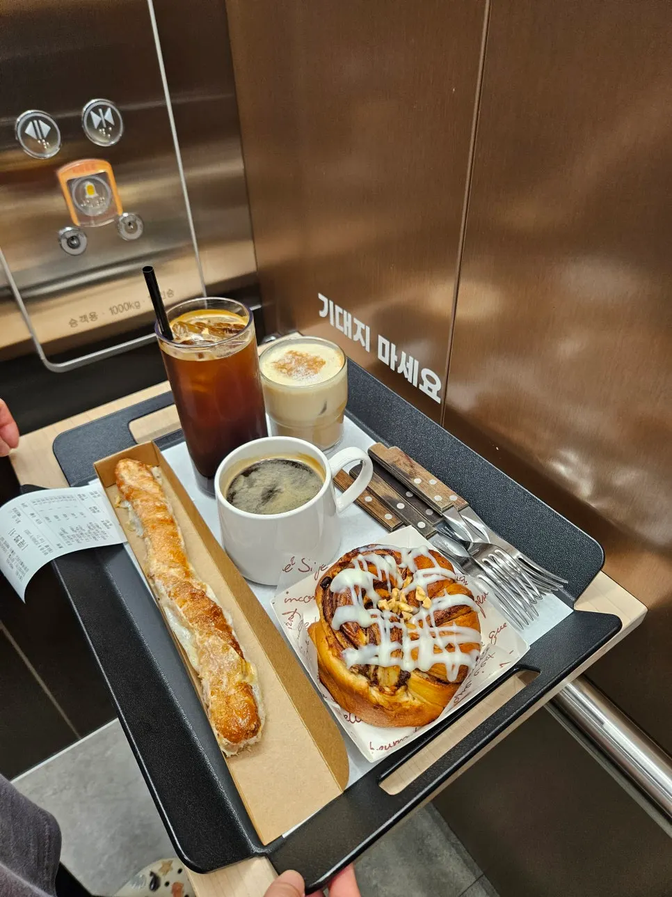 Interior of the café elevator with tray space