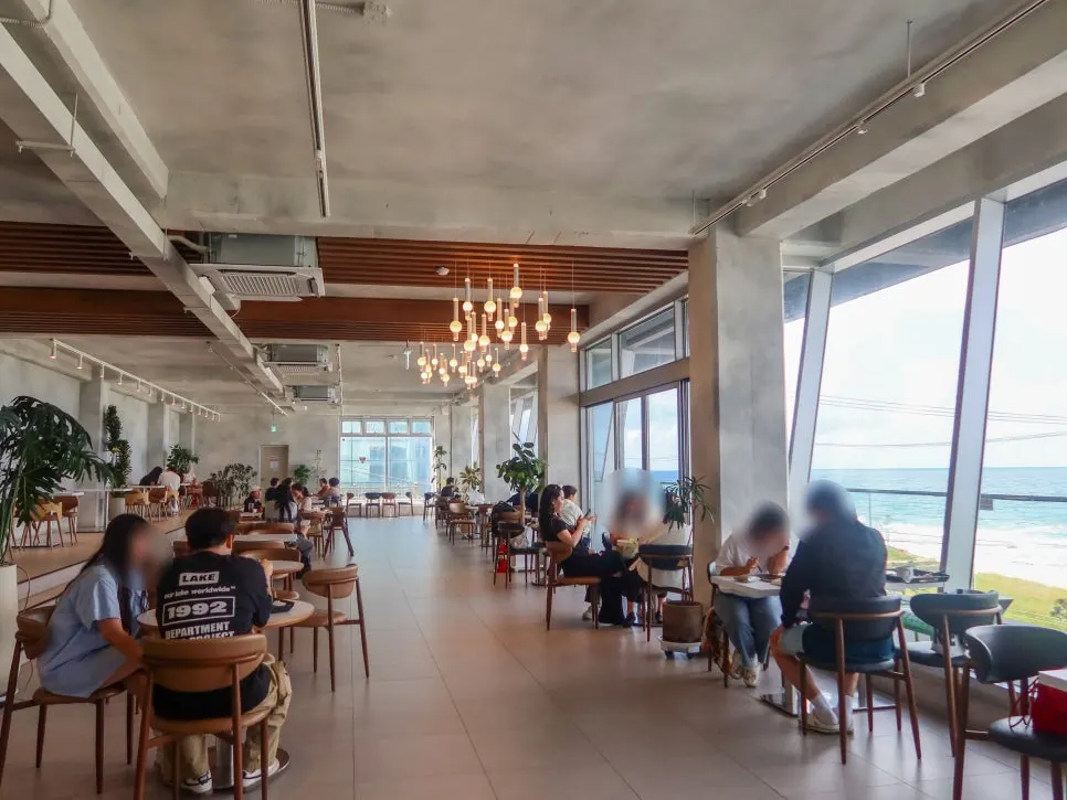Interior of Baegya Coffee's 3rd floor with sea views