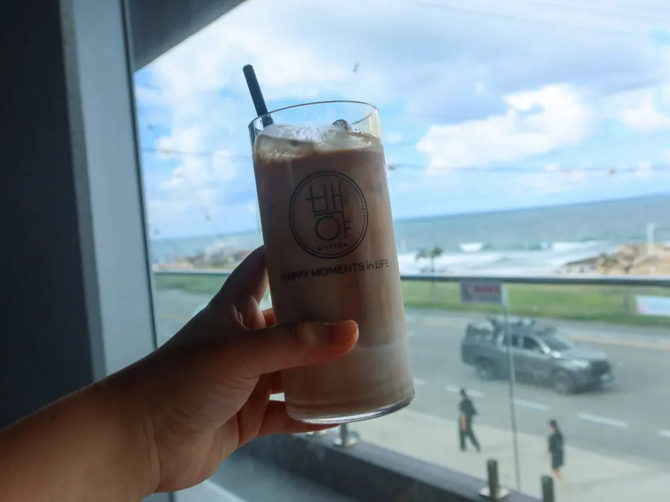 Coffee and bakery items enjoyed with a sea view