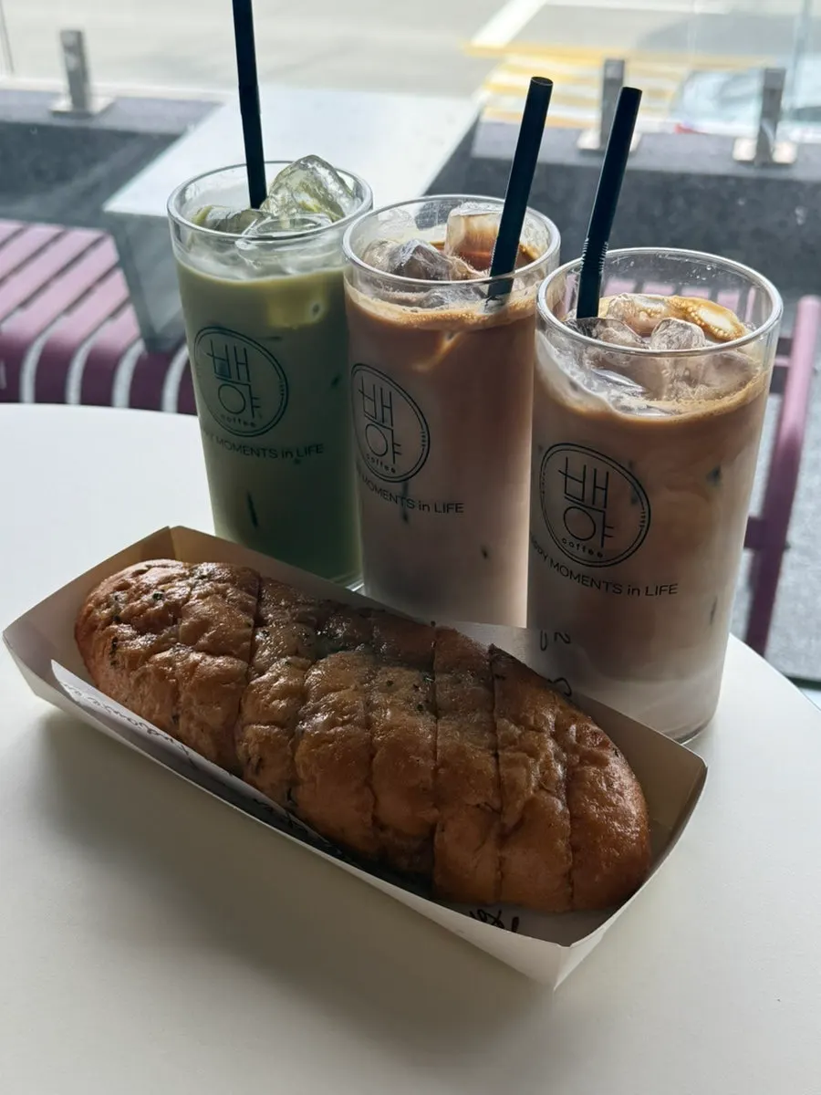 A drink by the window with the sea in the background