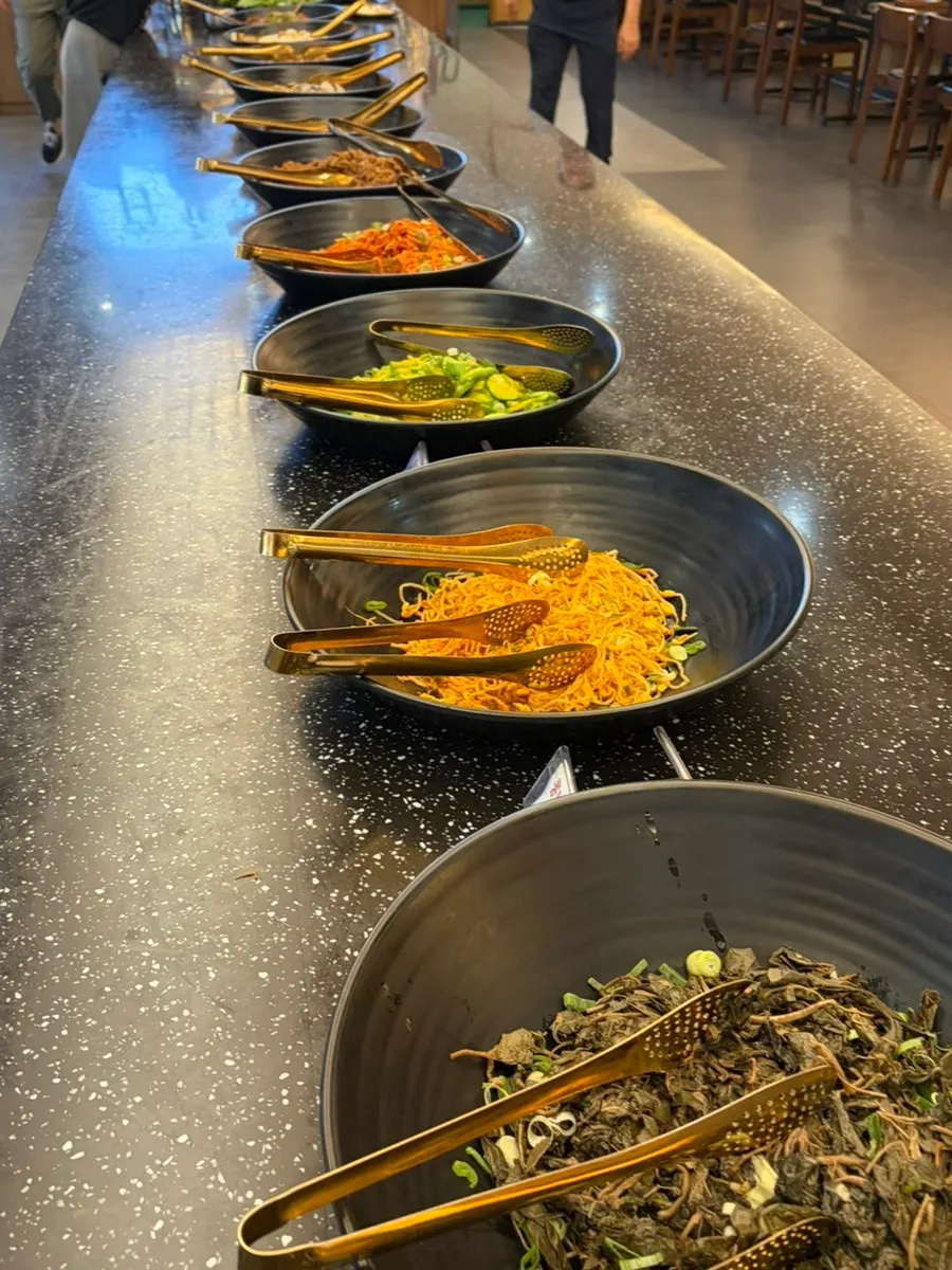 Namul banchan served in individual bowls at Baengnyeon Boribap