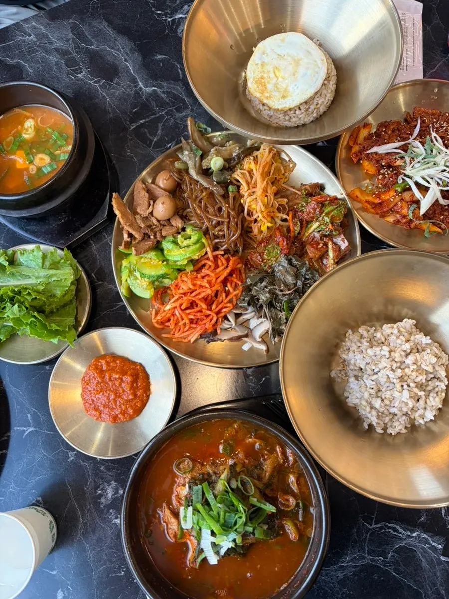 A big plate piled with namul and banchan