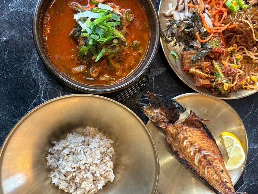 Aged kimchi cheonggukjang barley rice pork set spread