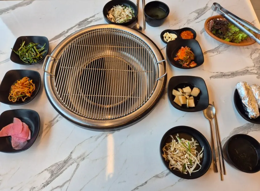 Basic side dishes and lettuce wraps set on the table
